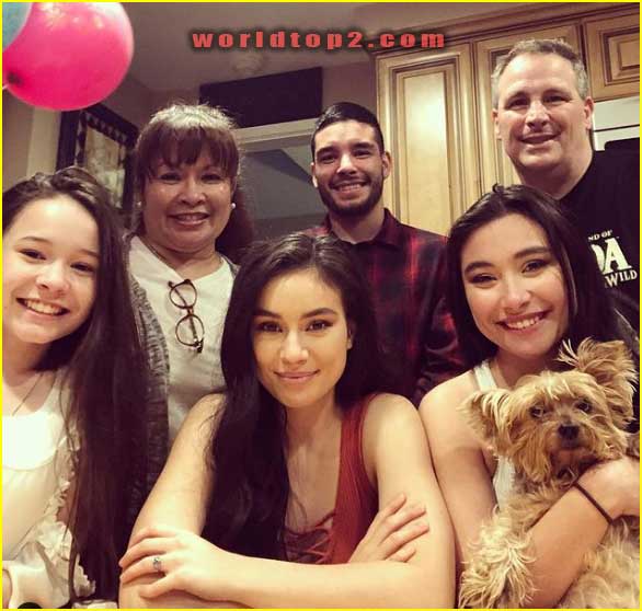 Madalyn Horcher with her parents and siblings